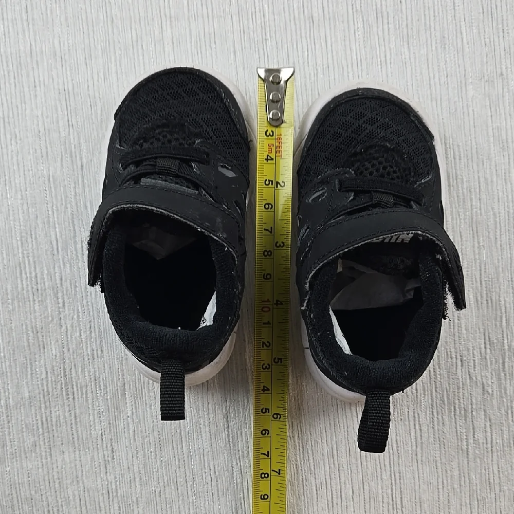 Nike Black and White Sneakers with Ankle Support‎